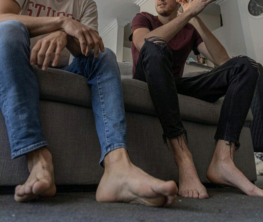Two Mens' Feet Served By Slave