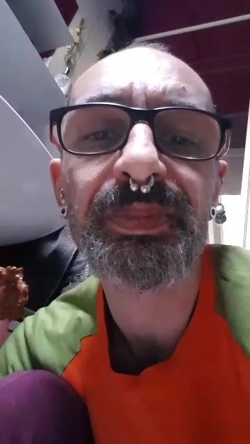 Pierced guy tasting his shit