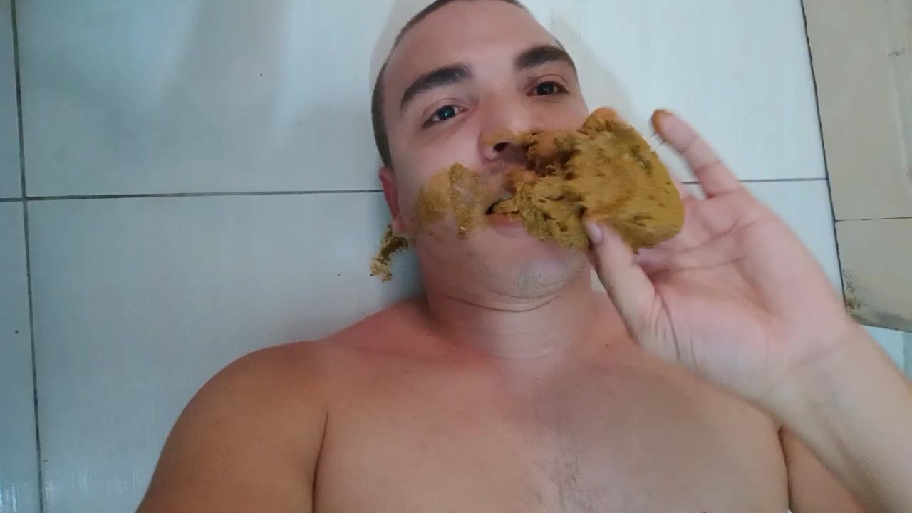 Brazilian guy getting a pile of shit in his mouth