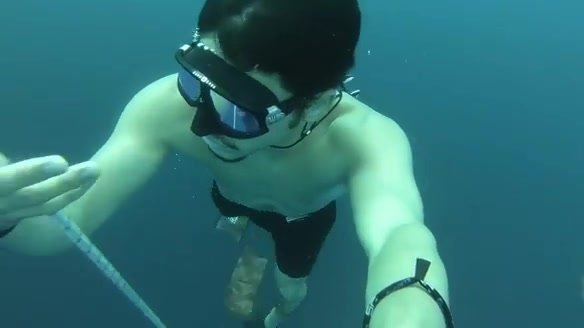 Underwater arab freediver static long breathold