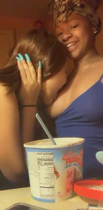 3 cute young ebony friends eat ice cream off titties