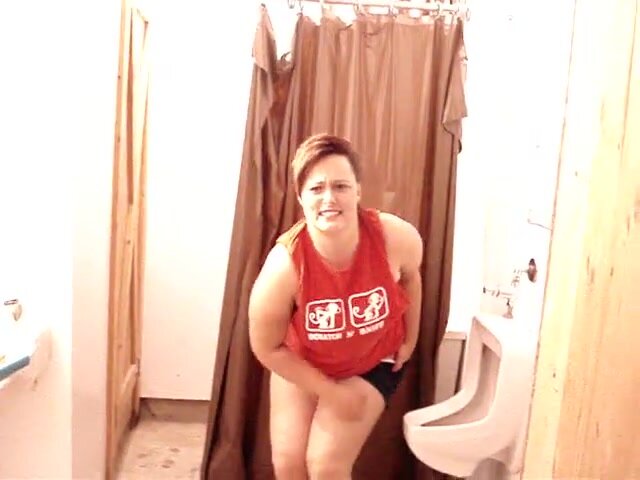 Thick white chick using the urinal