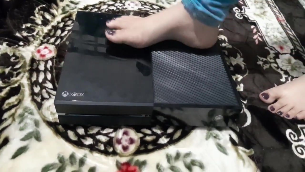 Woman barefoot tramples and stomps on Xbox One Part 1