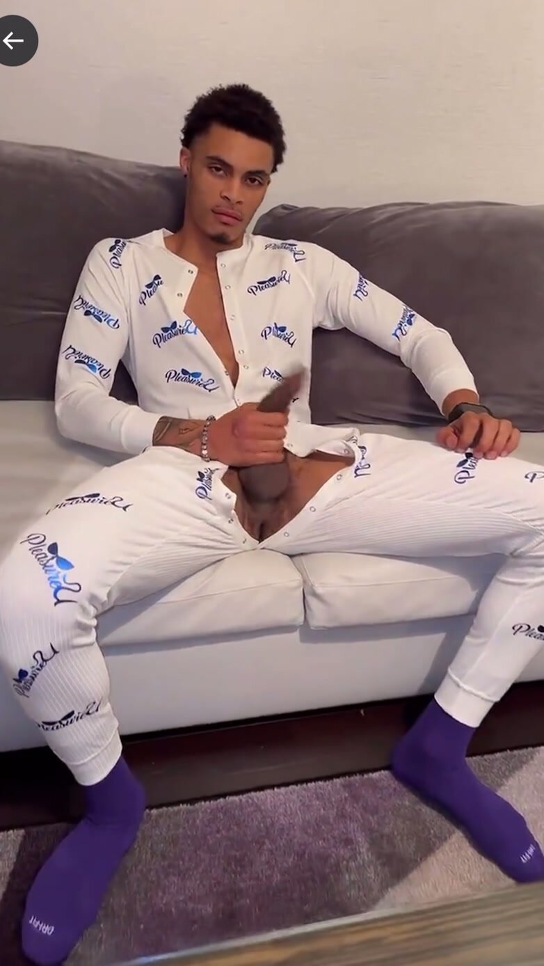Black Guy  rips open onesie  jerks off and cums!!