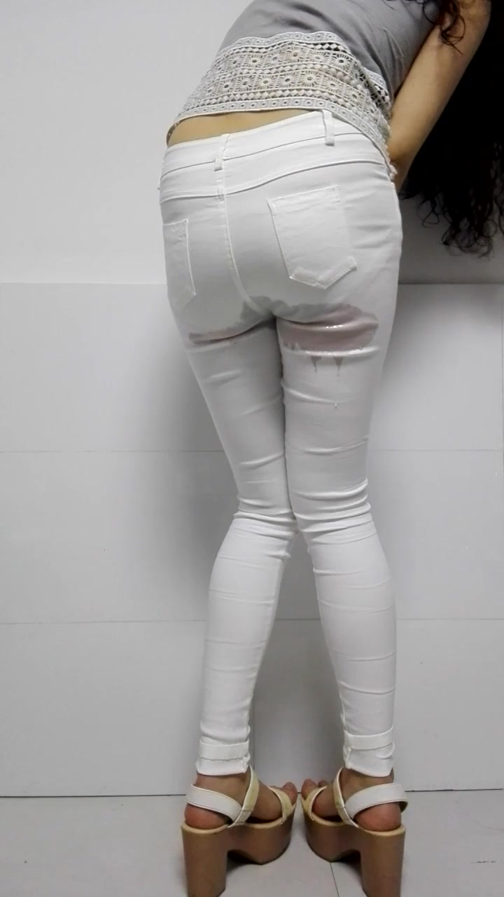 Desperate Girl Leaks in White Jeans
