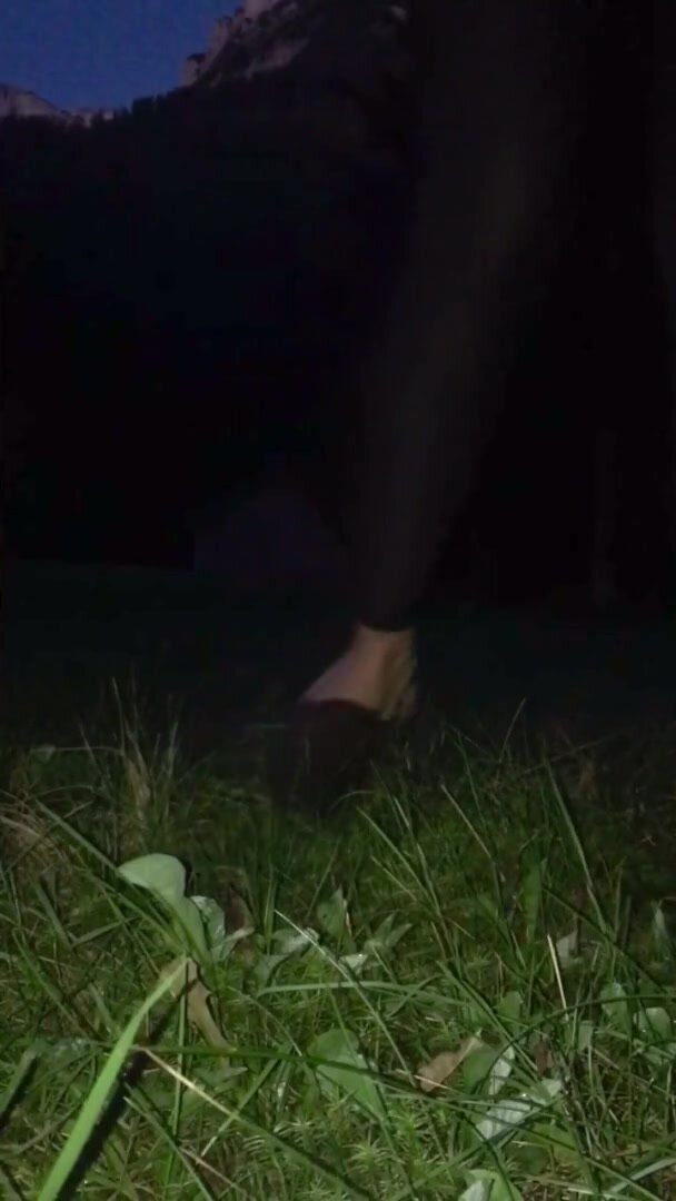 Girl peeing on the grass