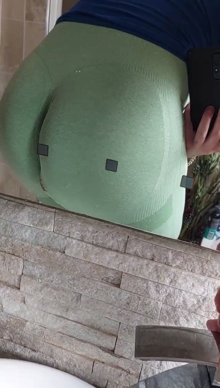 shit in green leggings
