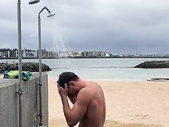 HUNK SHOWERS IN PUBLIC  AT BEACH