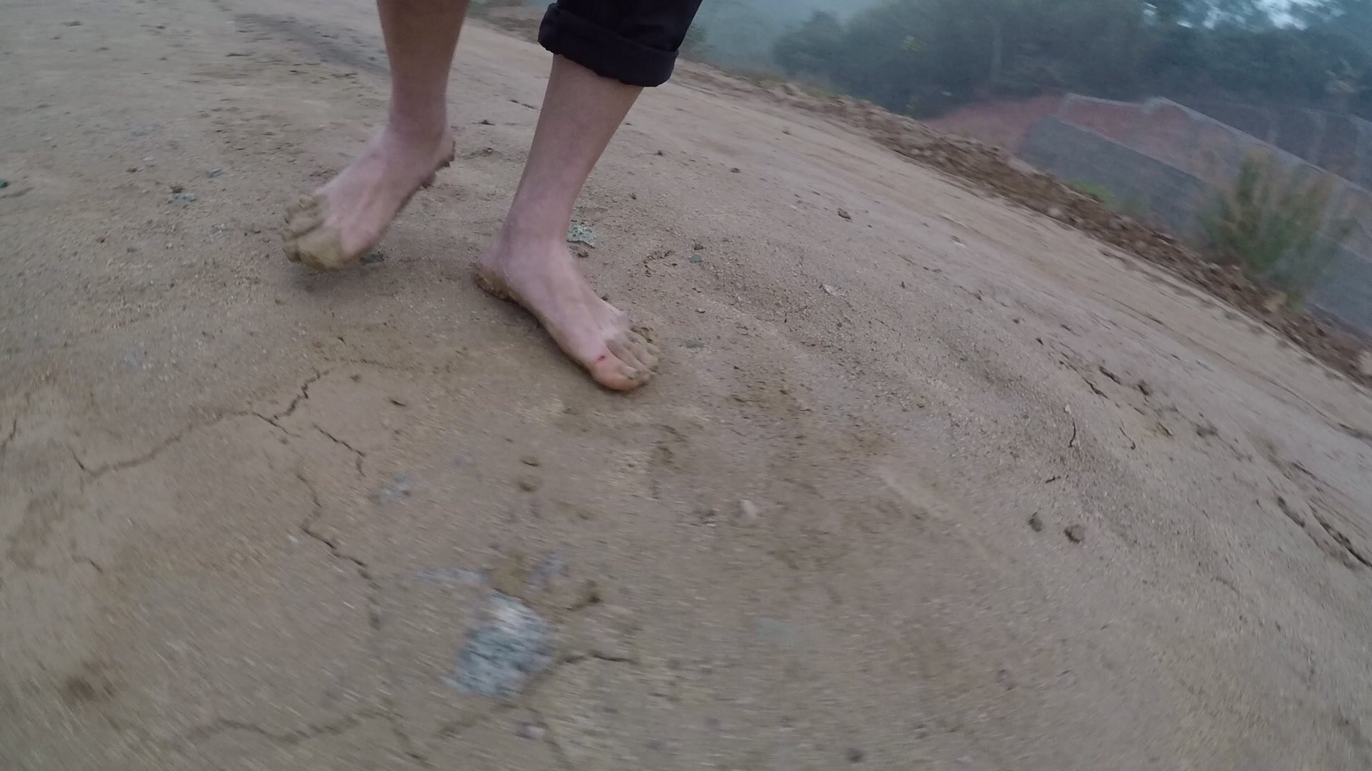 Walking barefoot in the mud