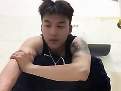 Handsome Asian twink smoking and shitting