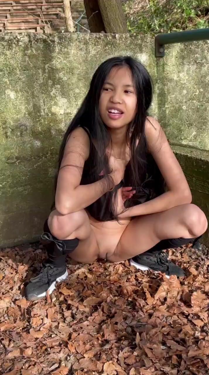 Asian girl peeing outside 1