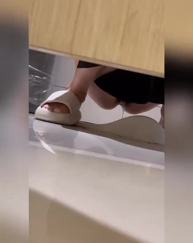 Asian beauty spied on in public bathroom