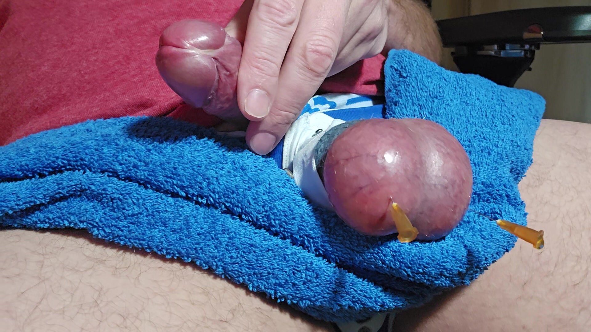 Ball needles from below with cum and ball juice