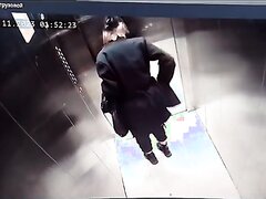 Girl pisses in an elevator
