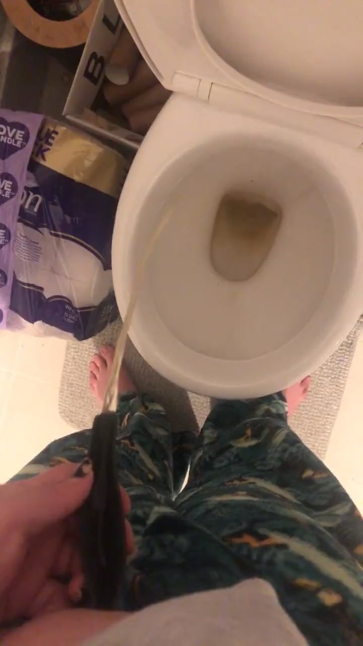 Barefoot babe uses she-wiz for her standing toilet leak