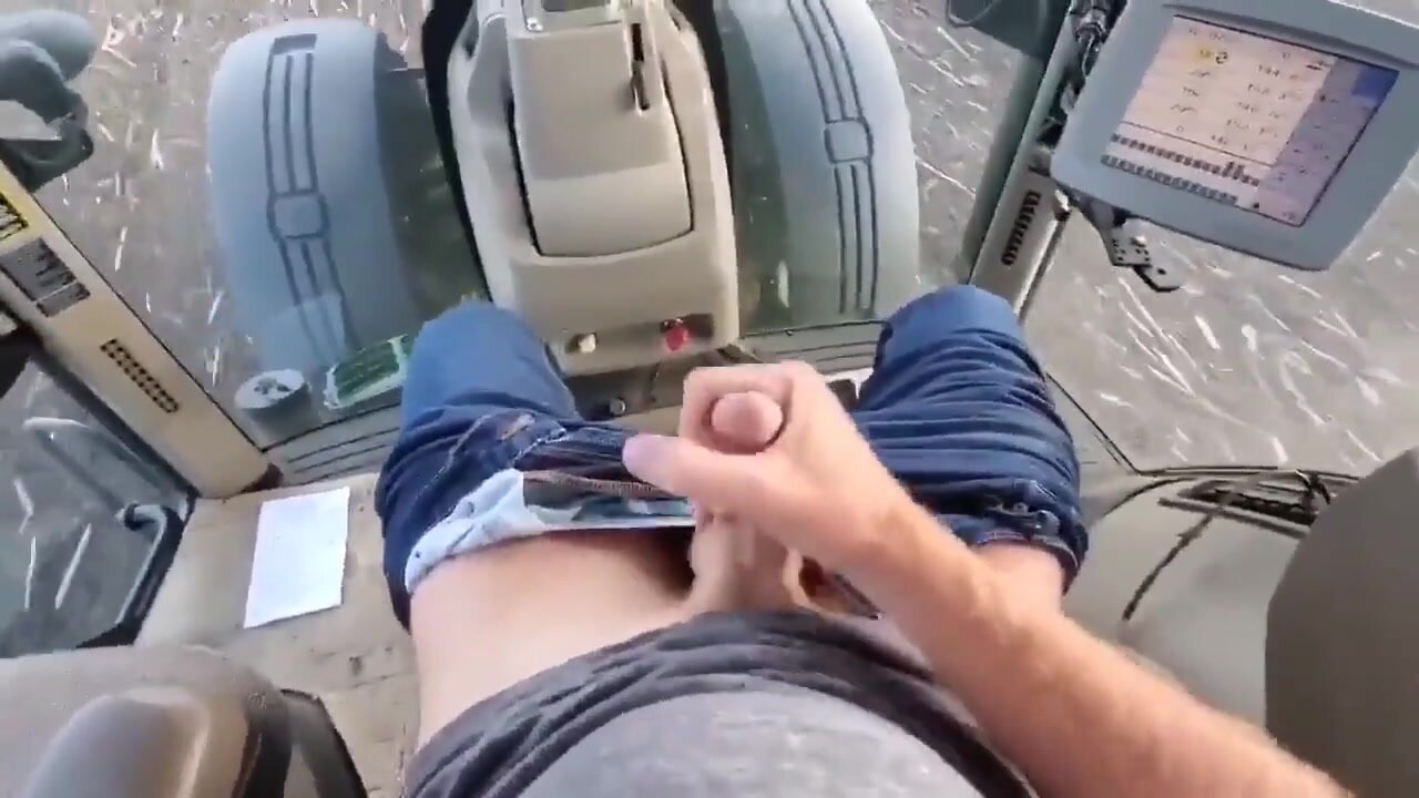 Farmer lad nuts on his tractor ride