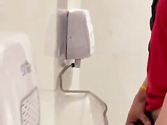 curious straight guy showing off cock at the urinal